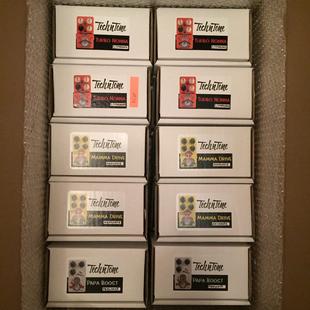Boxed, serial-numbered units packed for shipping